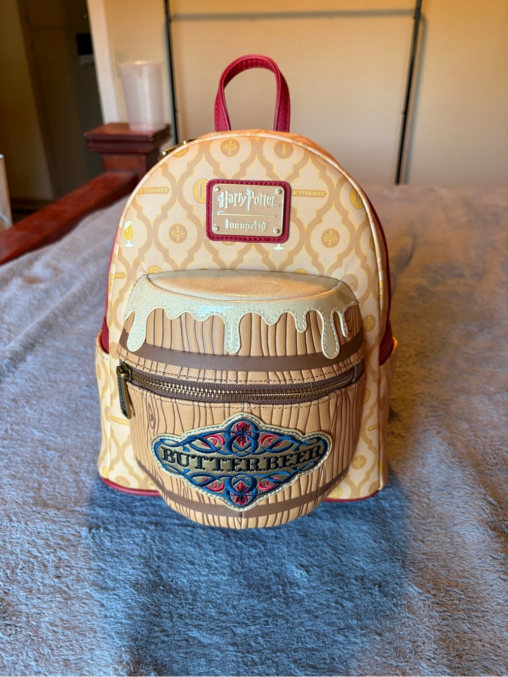 Loungefly Harry Potter Butterbeer Mini Backpack in Cream, Gold, Brown, Red, Blue